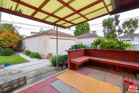 a view of a backyard with garden