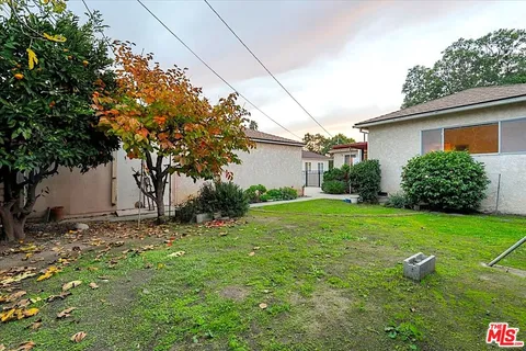 a view of backyard of house