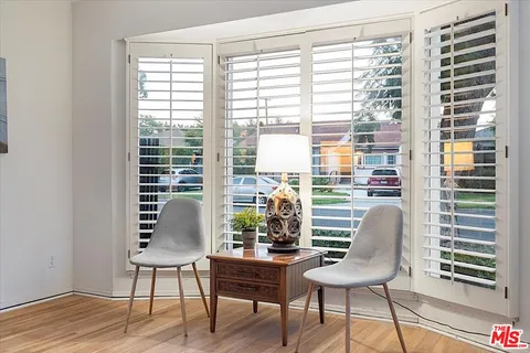 a room with furniture and a window