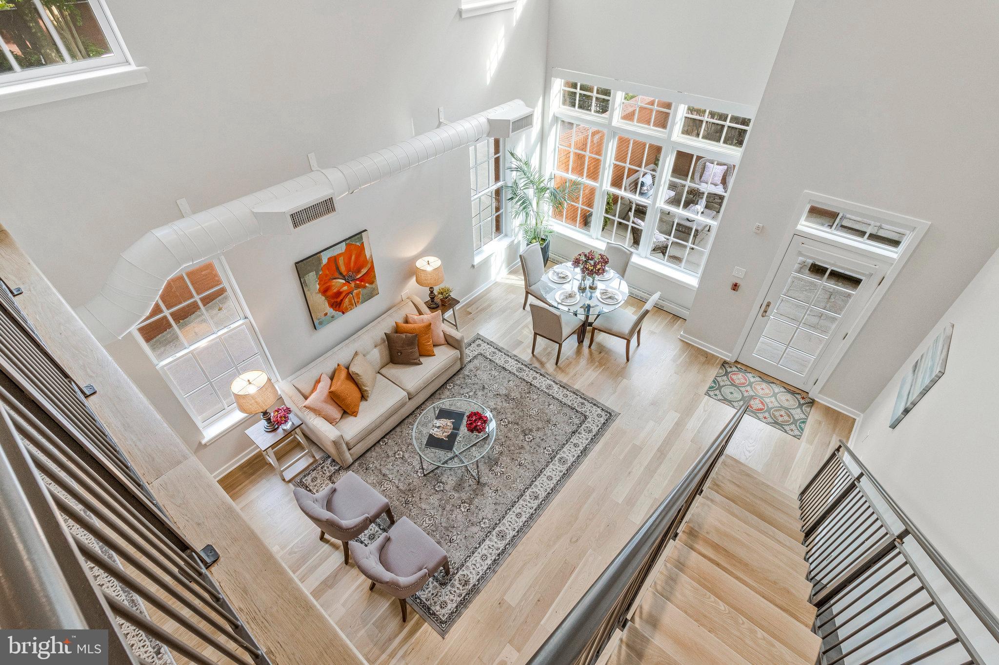 1610 North Queen Street, Unit 211 Arlington, VA 22209 - Photo 16 of 43 a view of living room and wooden floor