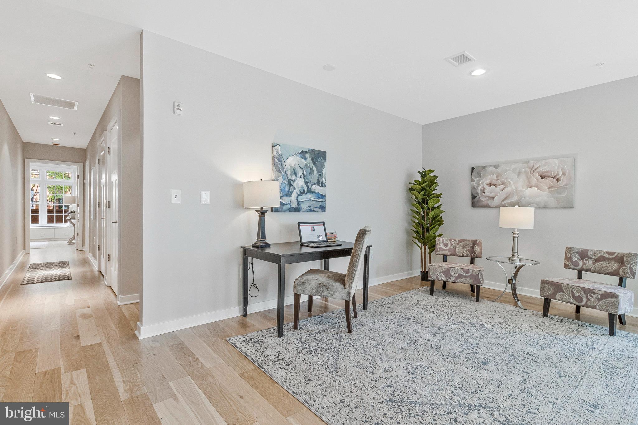 1610 North Queen Street, Unit 211 Arlington, VA 22209 - Photo 18 of 43 a view of a livingroom with furniture