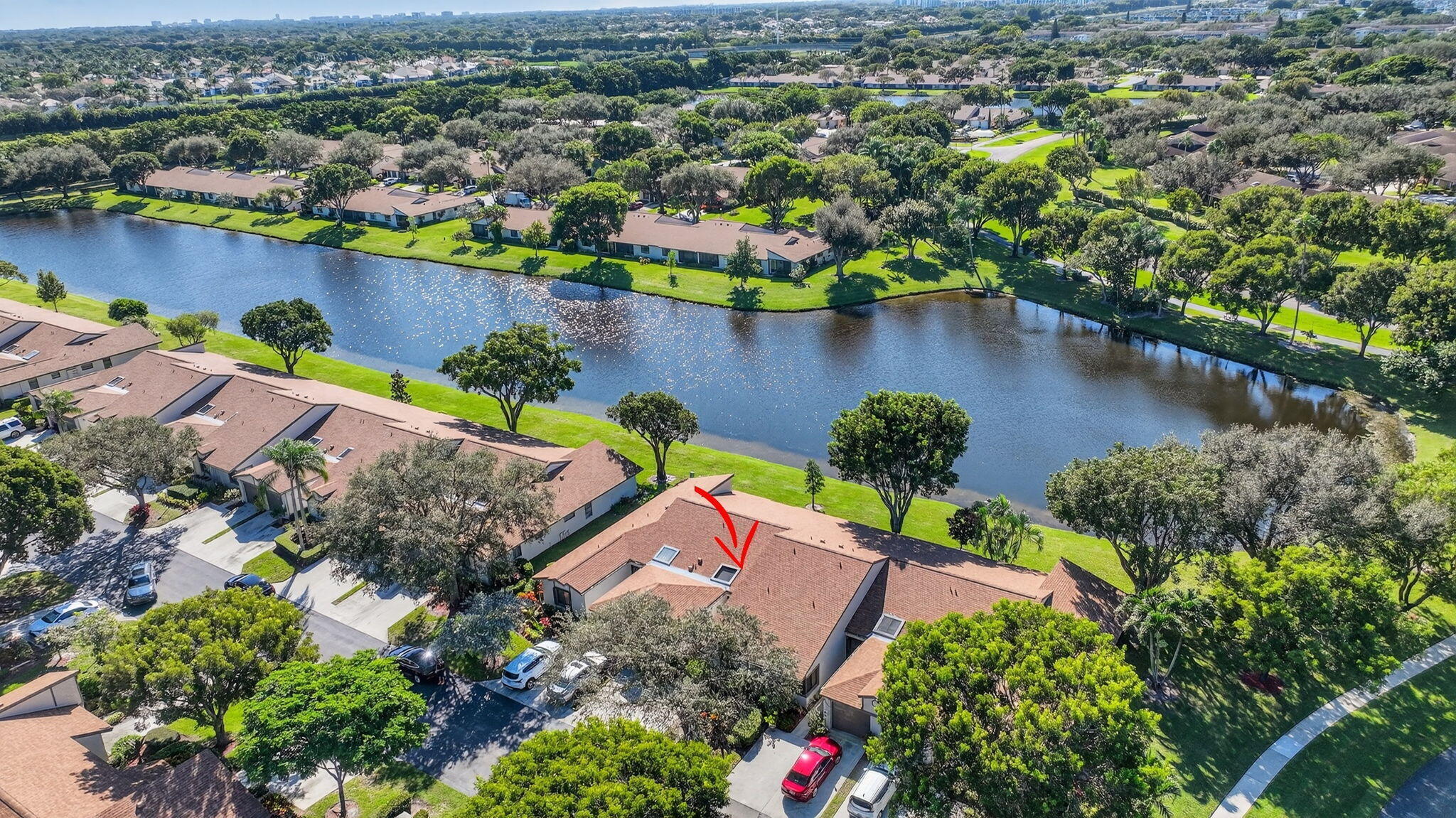8146 Windgate Drive Boca Raton, FL 33496 - Photo 17 of 24 an aerial view of a house with a lake view