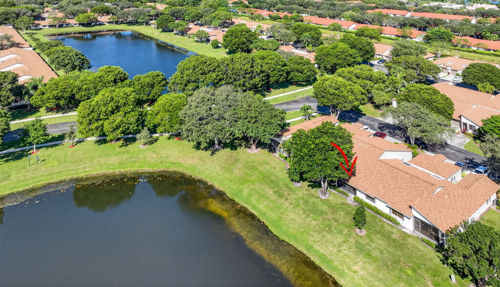8146 Windgate Drive Boca Raton, FL 33496 - Photo 18 of 24 an aerial view of residential houses with outdoor space and swimming pool