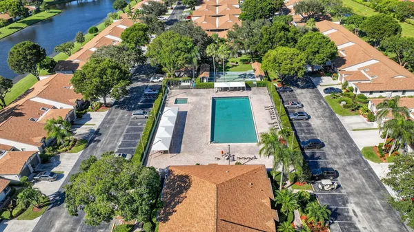 an aerial view of a house with outdoor space