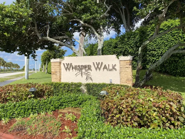 a sign on the side of the road