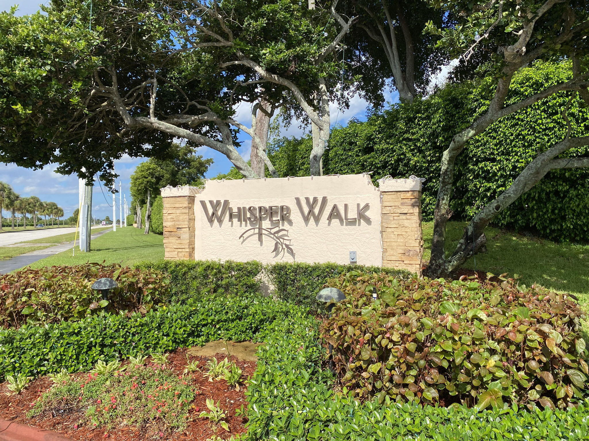 8146 Windgate Drive Boca Raton, FL 33496 - Photo 24 of 24 a sign on the side of the road