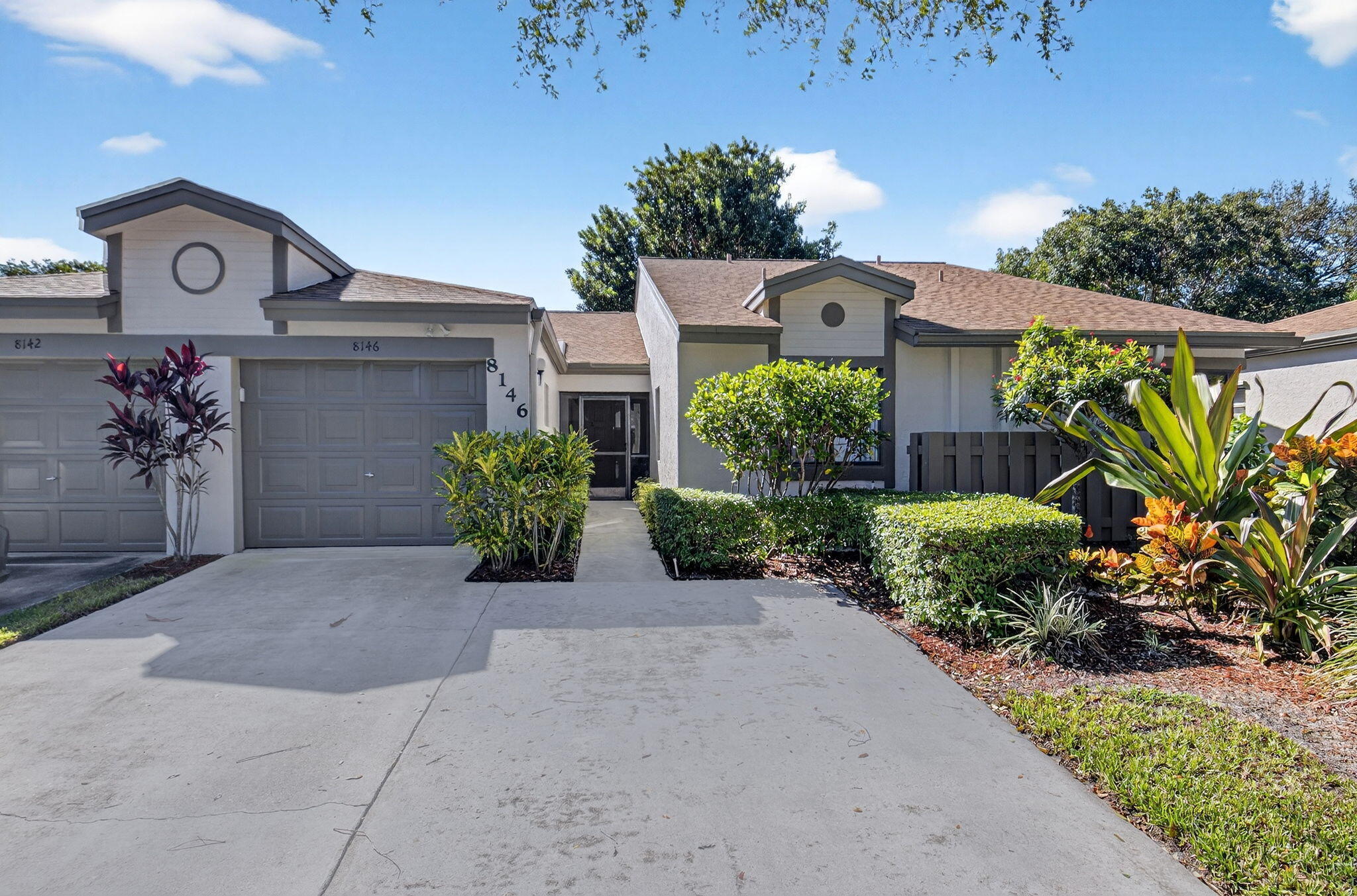 8146 Windgate Drive Boca Raton, FL 33496 - Photo 3 of 24 front view of a house
