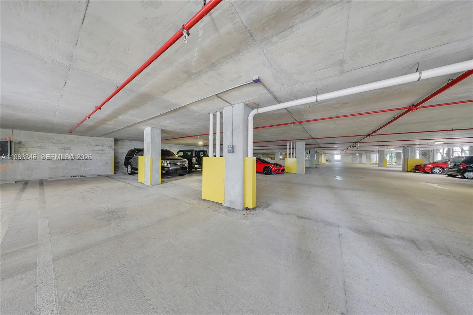 321 Northeast 26th Street, Unit 701 Miami, FL 33137 - Photo 23 of 24 a view of parking garage with refrigerator