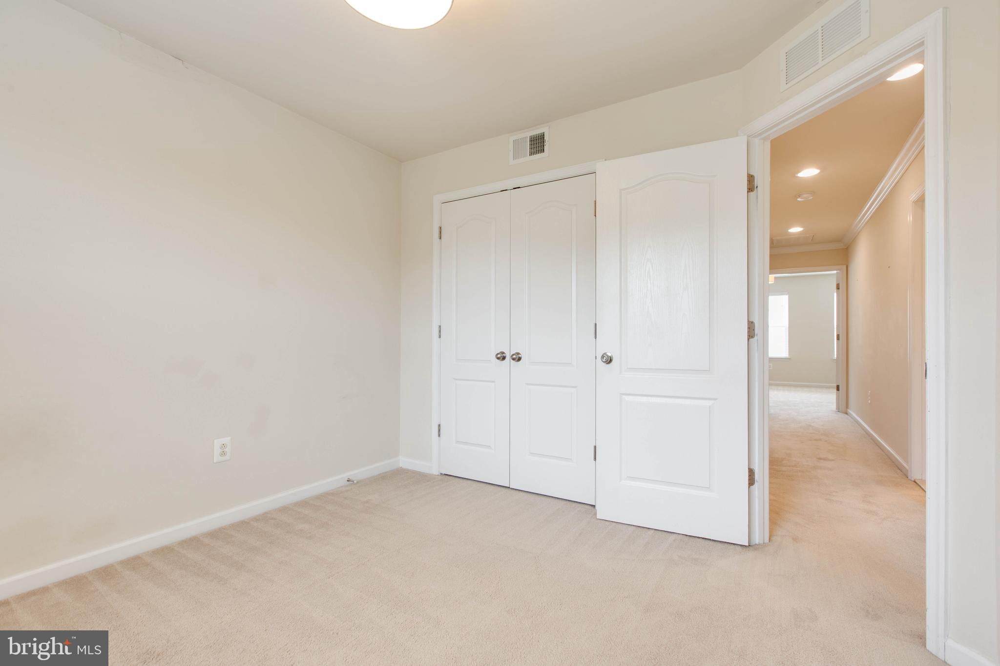 7048 Foxton Way Hanover, MD 21076 - Photo 38 of 52 a view of an empty room
