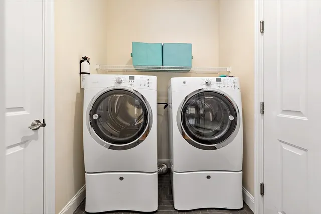 a utility room with dryer and washer