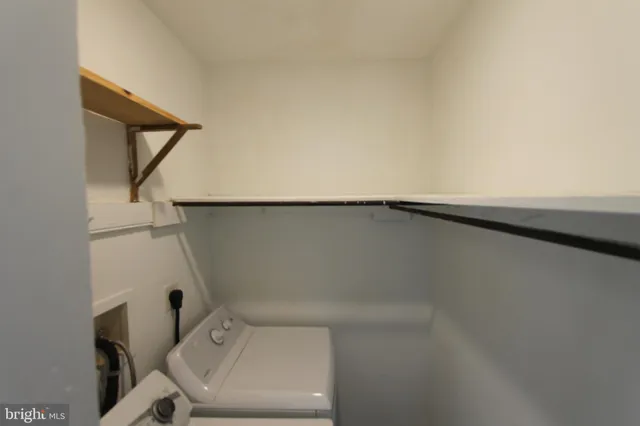 a bathroom with a toilet and a sink