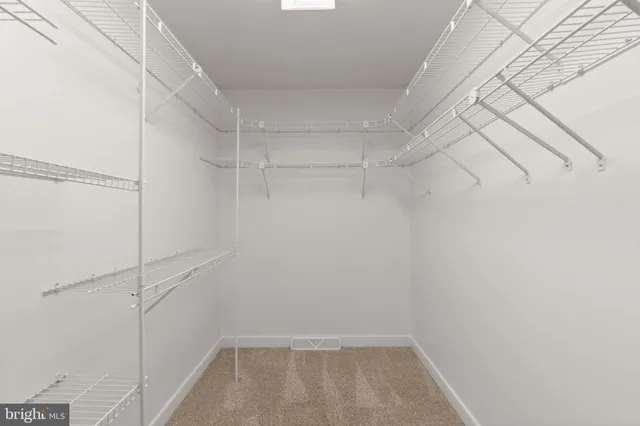 a view of a room with racks on the wall