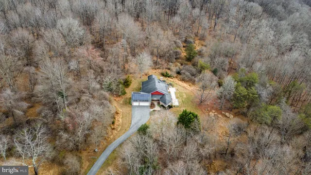a picture of a bathroom with a shower