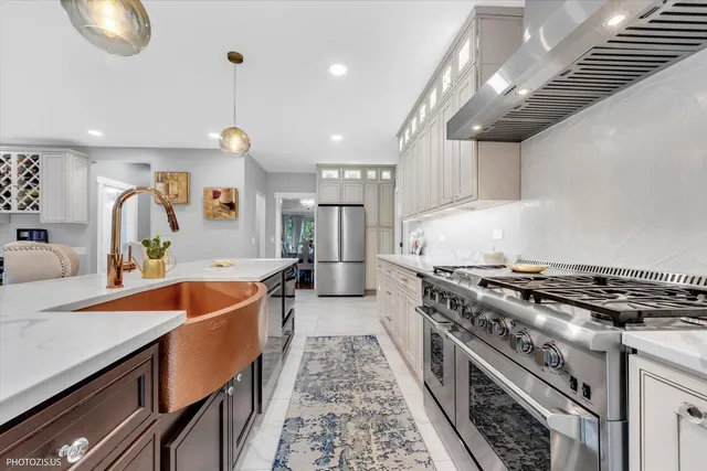 a view of a hallway with windows and stairs