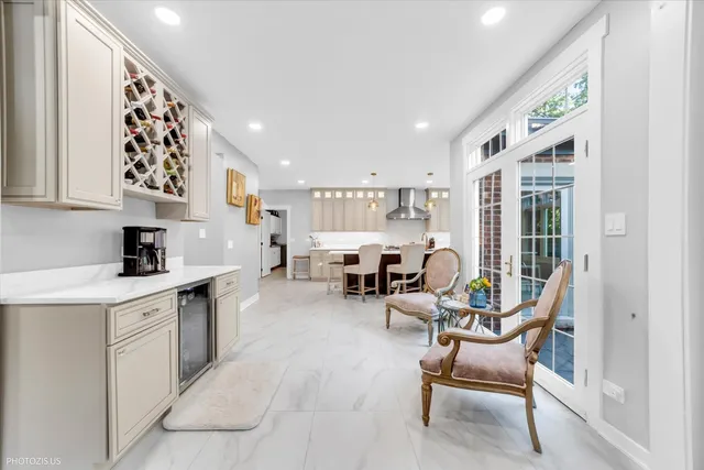 a bedroom with a bed wooden floor and window