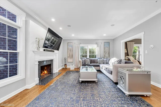 a spacious bedroom with a bed a couch and dresser