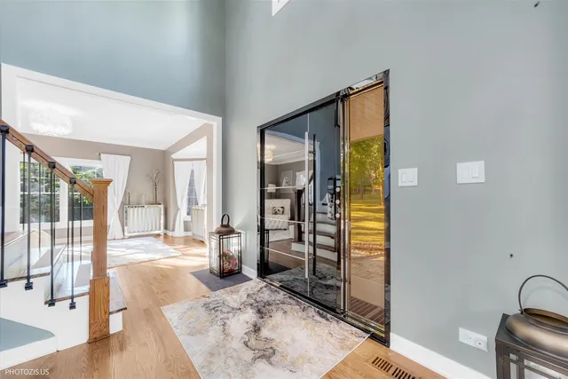 a view of a house with a yard and sitting area