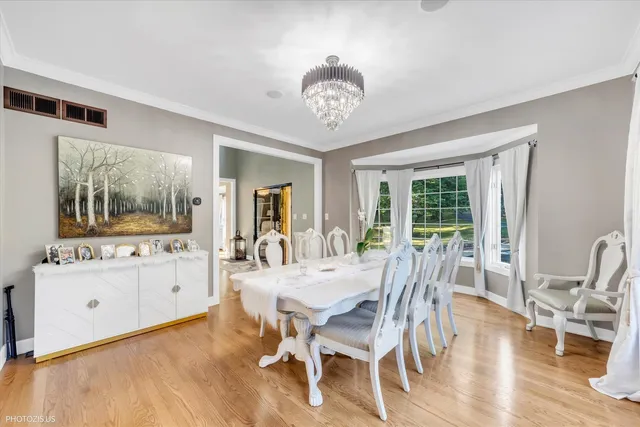 a view of a house with backyard porch and sitting area