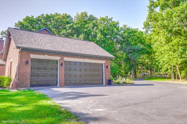 a kitchen with a refrigerator and sink