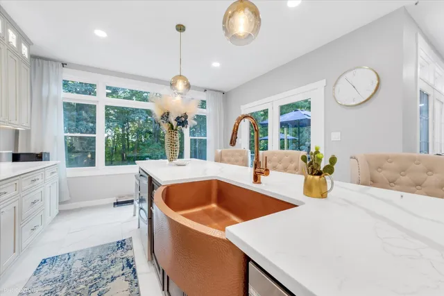 a view of a dining room with furniture window and outside view