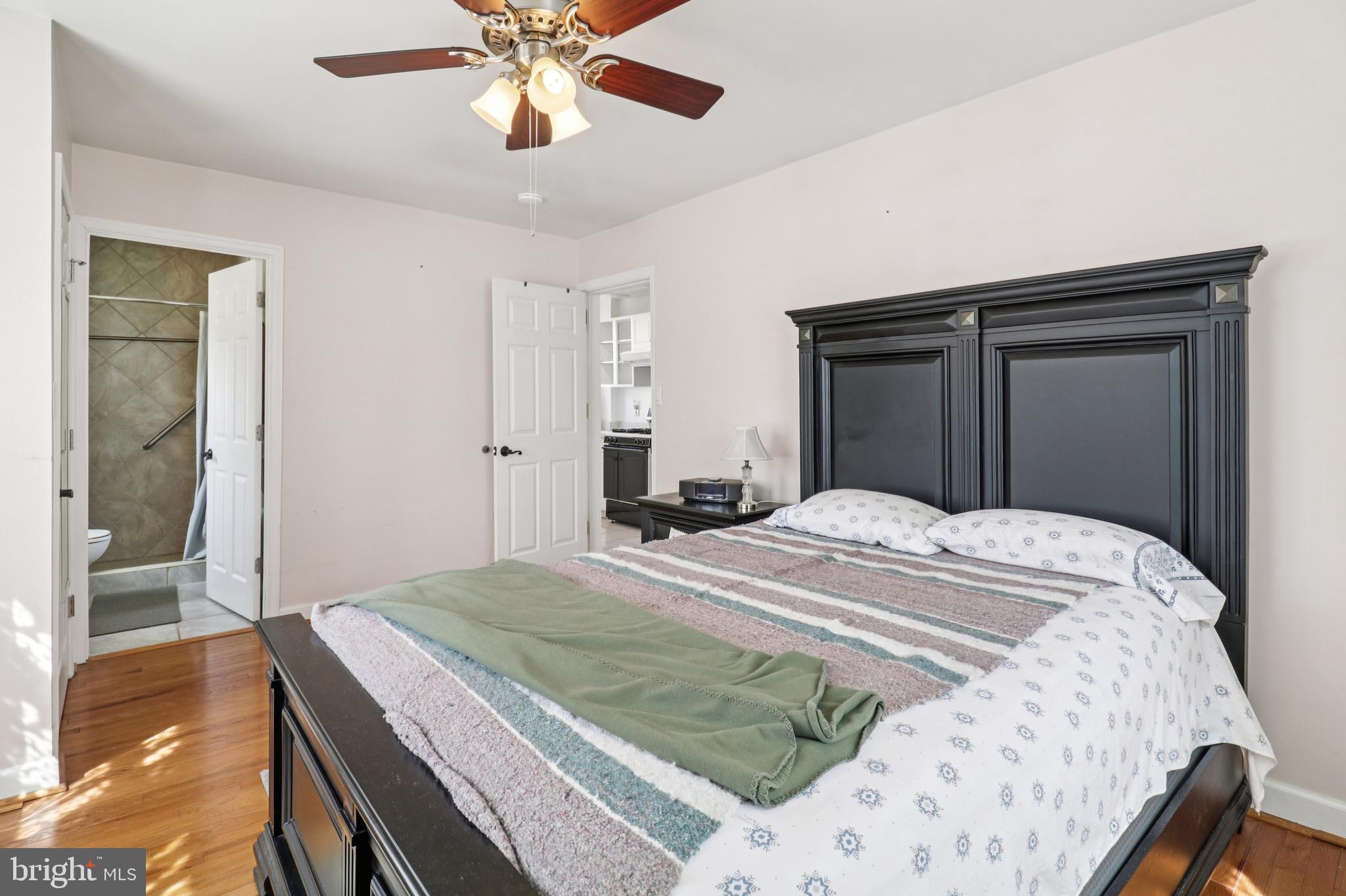 3149 Newton Street Northeast Washington, DC 20018 - Photo 25 of 57 Main level BR w/ceiling fan/light