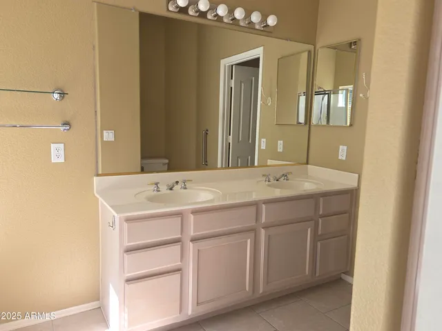 a bathroom with a bathtub and a sink