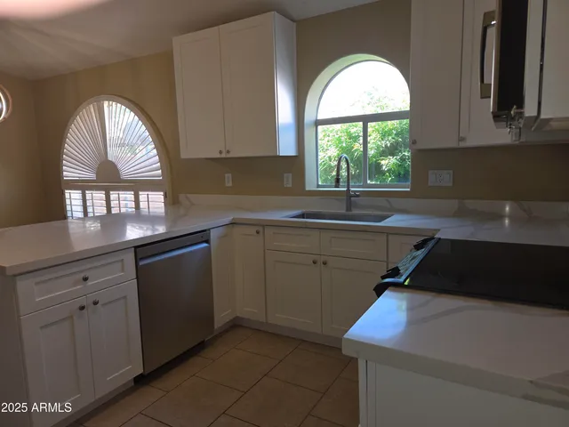 a view of refrigerator in kitchen