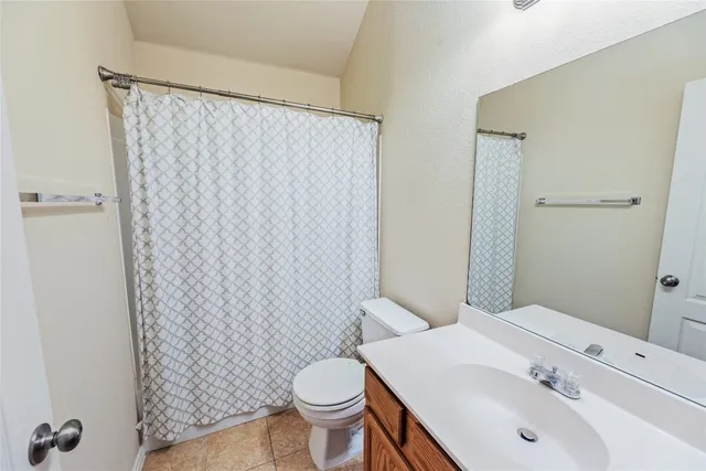 a bathroom with a sink and toilet