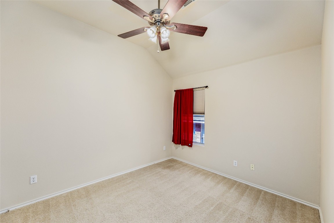 1613 Bowerton Drive Austin, TX 78754 - Photo 23 of 30 an empty room with a window and a fan