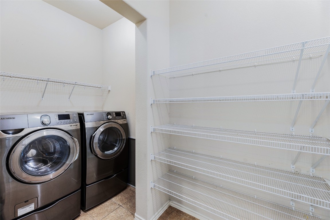 1613 Bowerton Drive Austin, TX 78754 - Photo 25 of 30 a utility room with dryer and washer