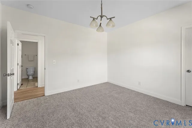 a view of a room with a hallway