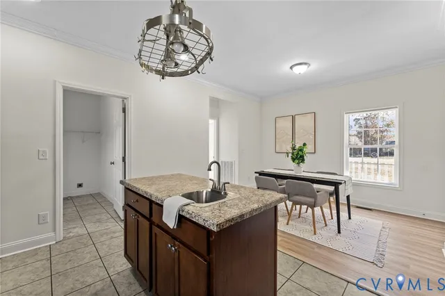 a dining hall with a dining table and chairs