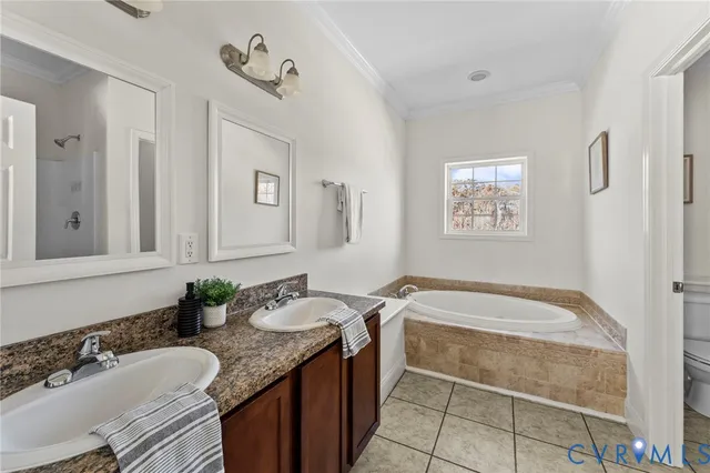 a spacious bathroom with a granite countertop tub sink and mirror