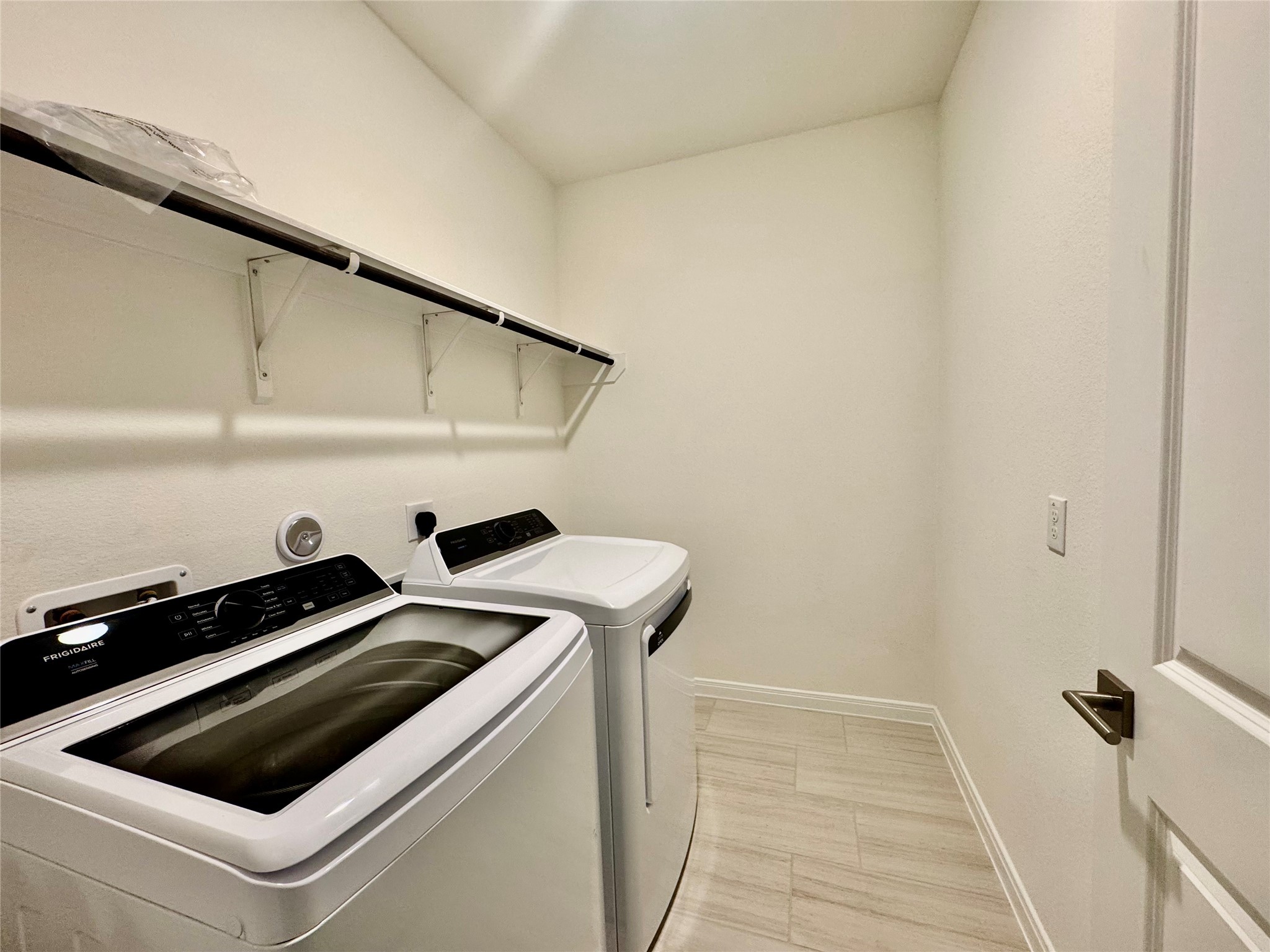 8923 Moose Trail Manvel, TX 77578 - Photo 20 of 20 a utility room with dryer and washer