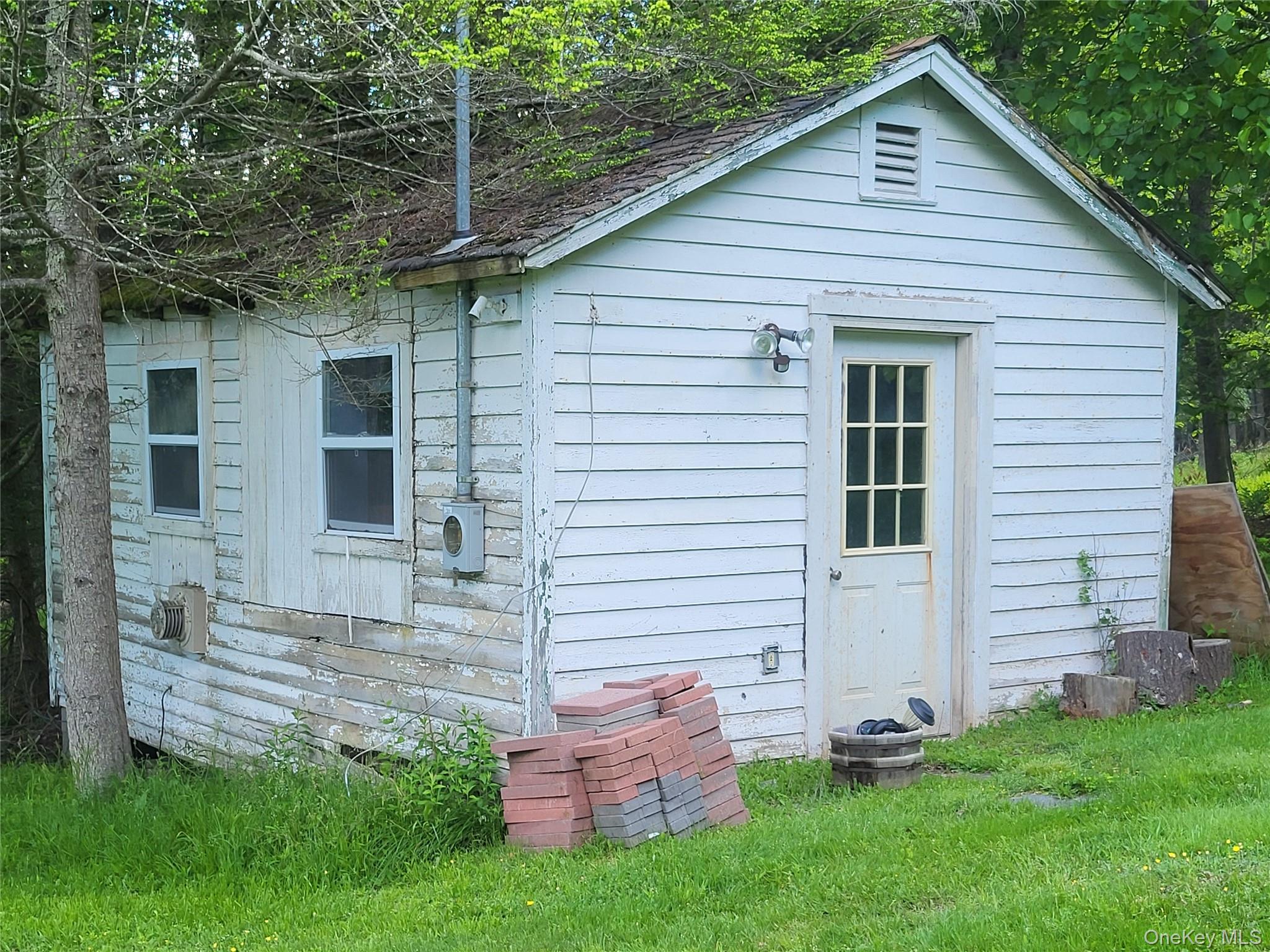 286 Dingle Daisy Road Monticello, NY 12701 - Photo 29 of 35 a view of a house with a backyard