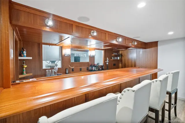 a view of a dining area with furniture and chandelier