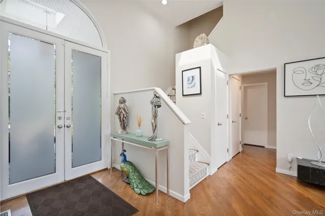 a view of entryway with wooden floor