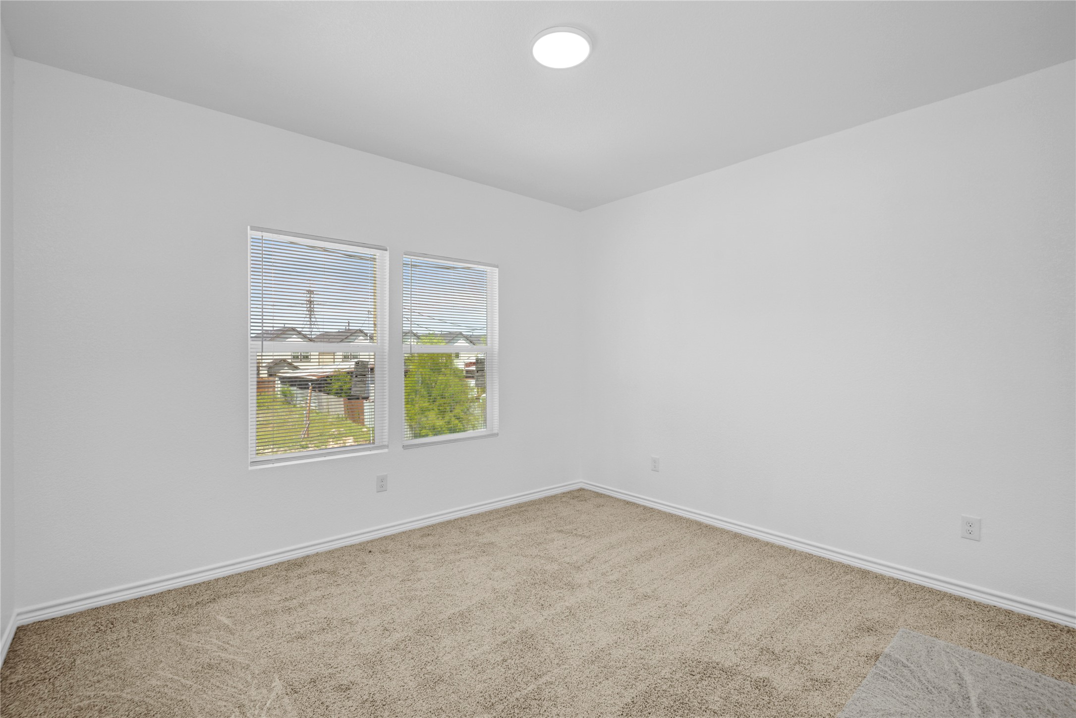 9932 Fillmore Street Houston, TX 77029 - Photo 15 of 27 an empty room with a window