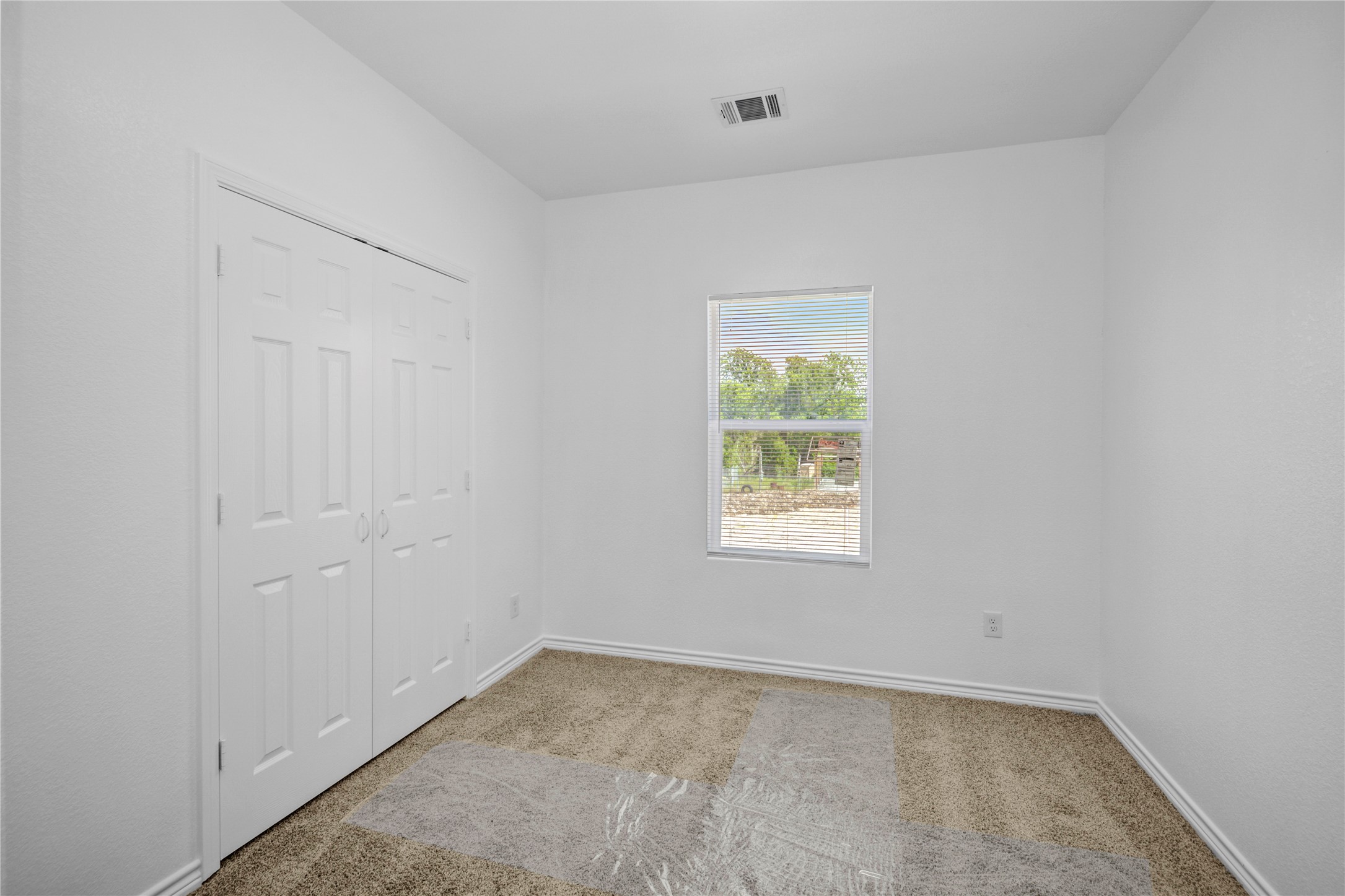 9932 Fillmore Street Houston, TX 77029 - Photo 17 of 27 an empty room with a window