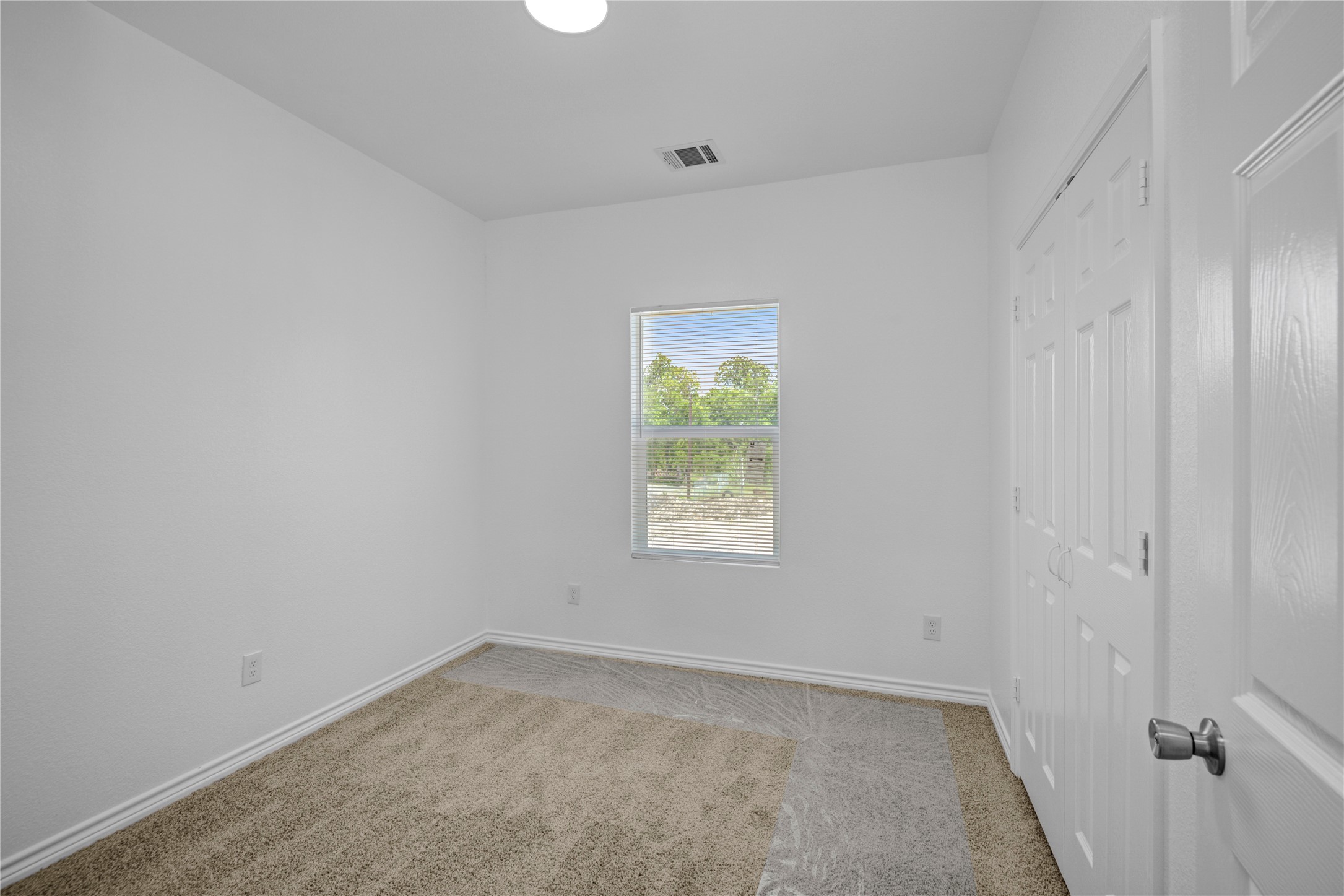 9932 Fillmore Street Houston, TX 77029 - Photo 18 of 27 an empty room with a window