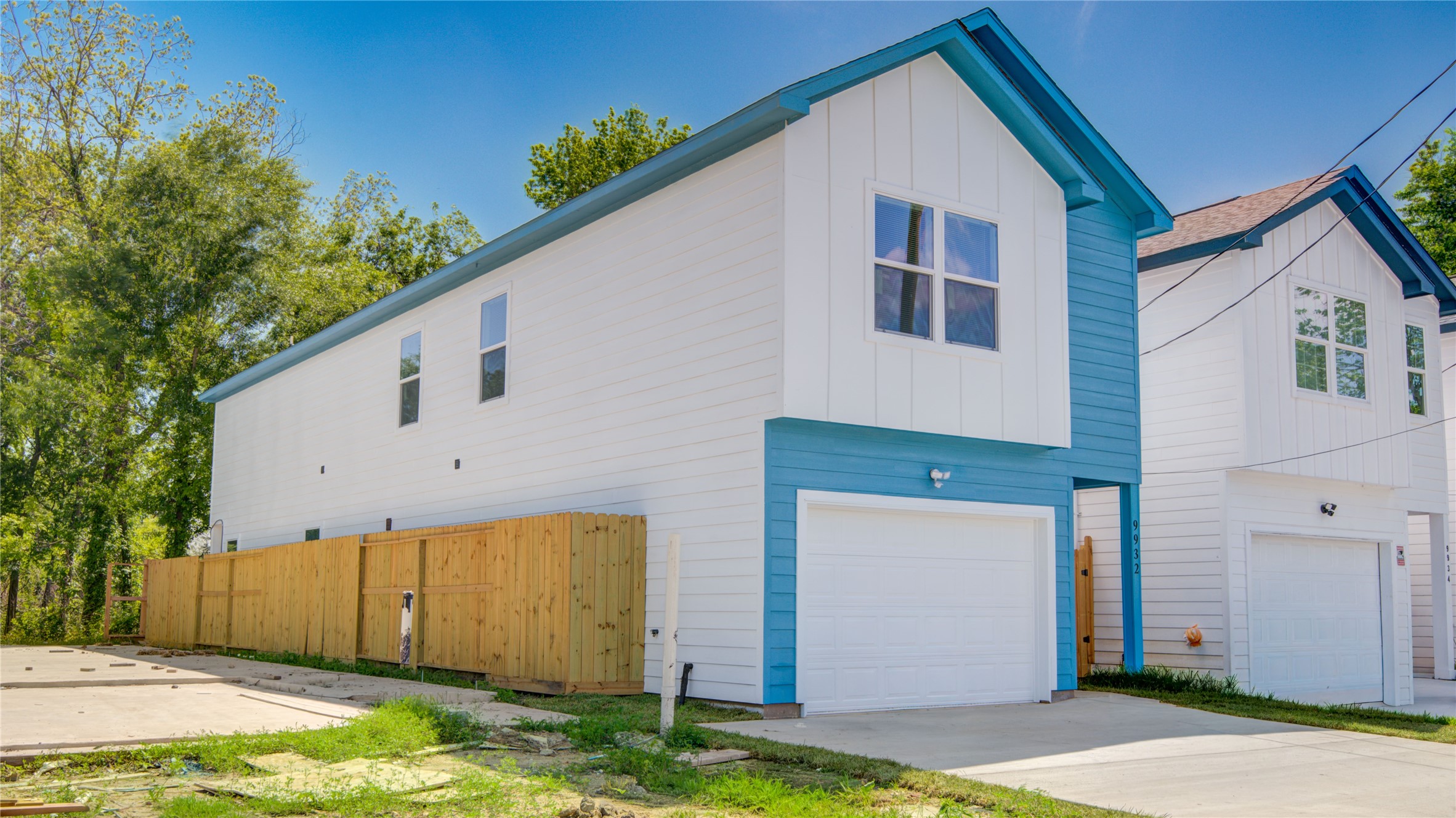 9932 Fillmore Street Houston, TX 77029 - Photo 4 of 27 a view of a house with backyard and tree