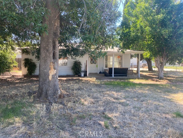 8458 Bruce Avenue Riverside, CA 92503 - Photo 1 of 1 a view of a house with yard and tree s