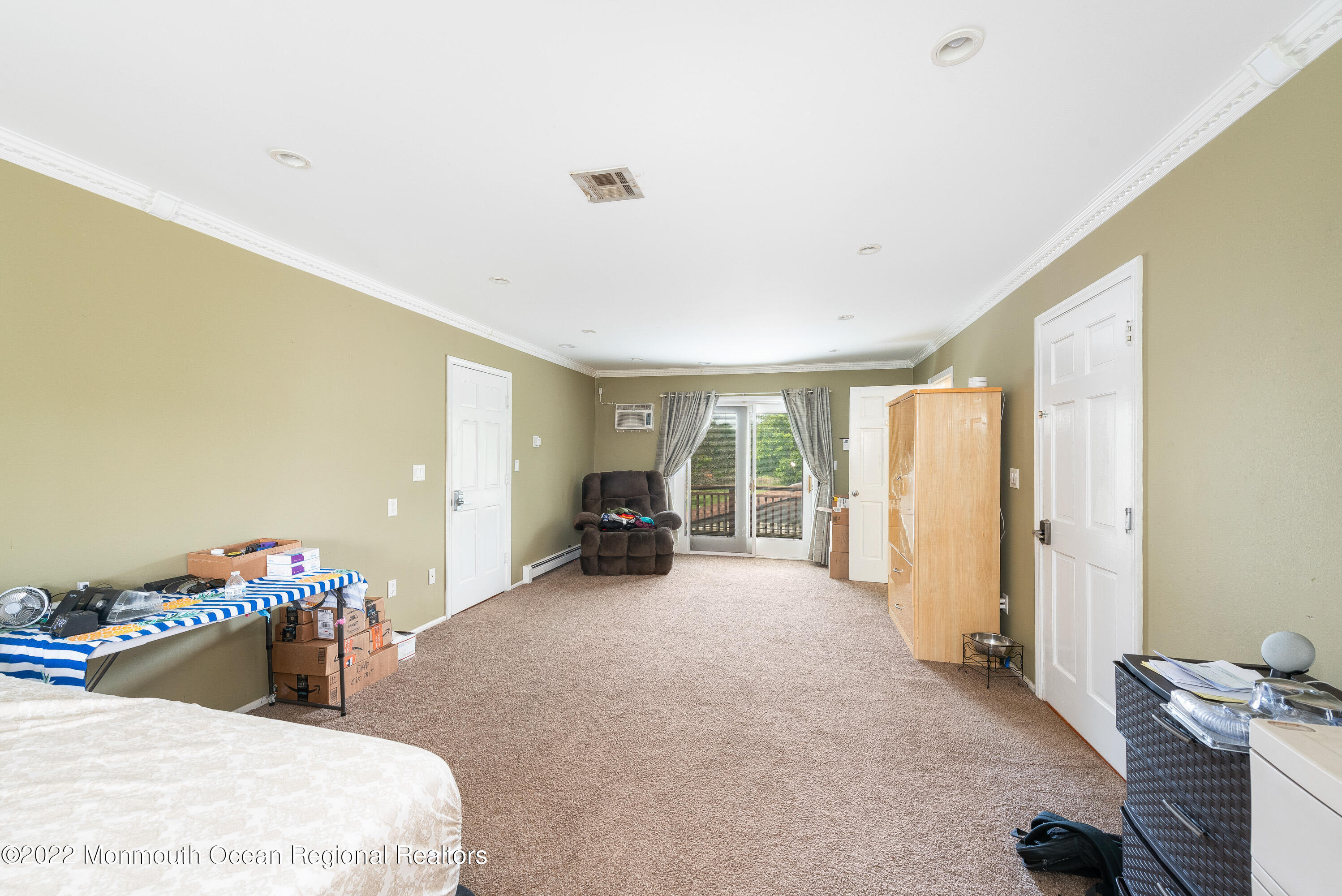 161 Thompson Grove Road Manalapan, NJ 07726 - Photo 13 of 27 a bedroom with bed and a large window