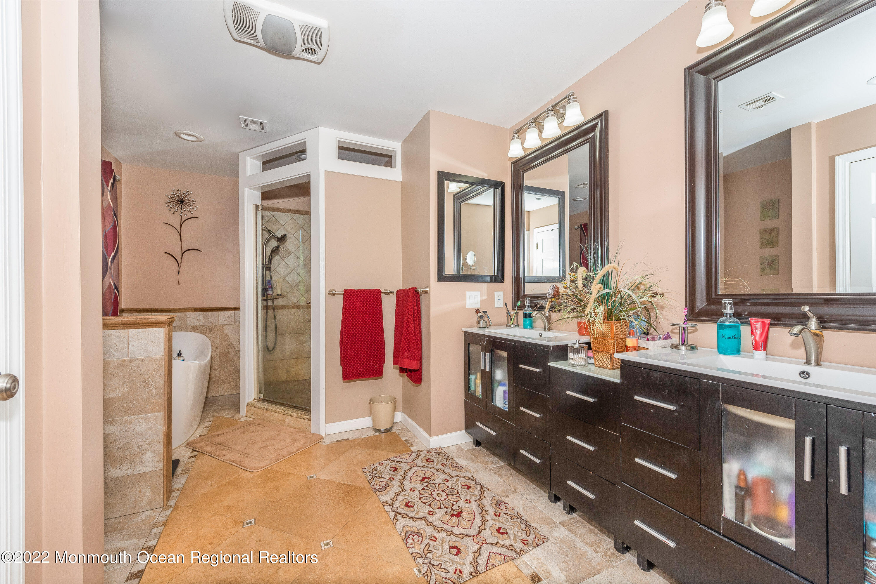 161 Thompson Grove Road Manalapan, NJ 07726 - Photo 14 of 27 a bathroom with a sink vanity and a mirror