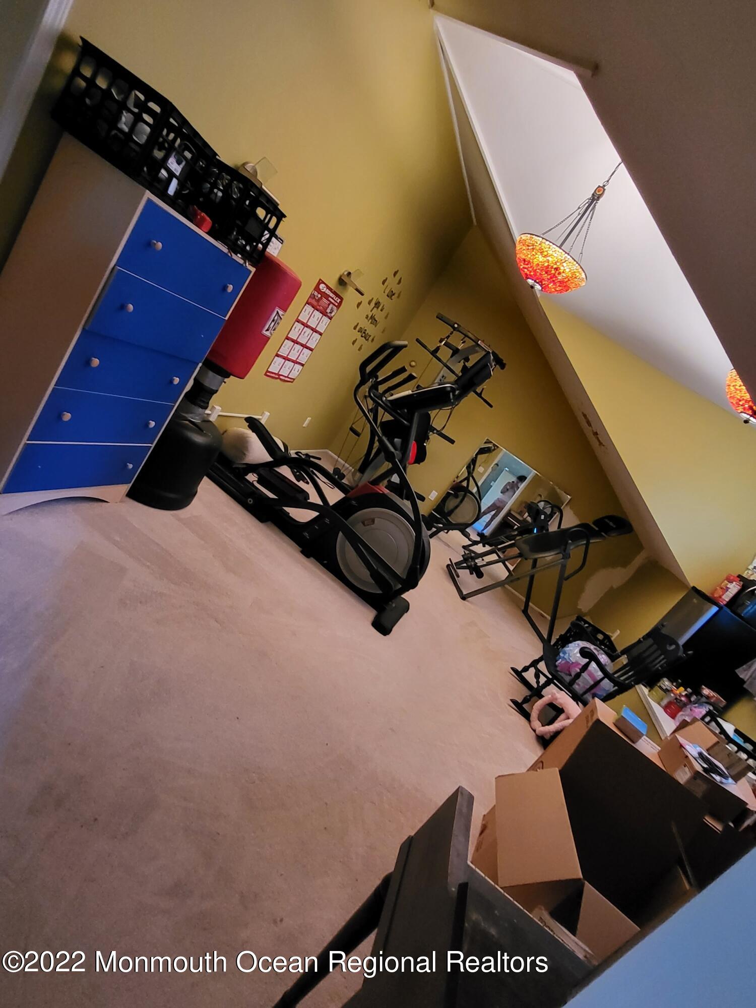 161 Thompson Grove Road Manalapan, NJ 07726 - Photo 16 of 27 a view of gym equipment