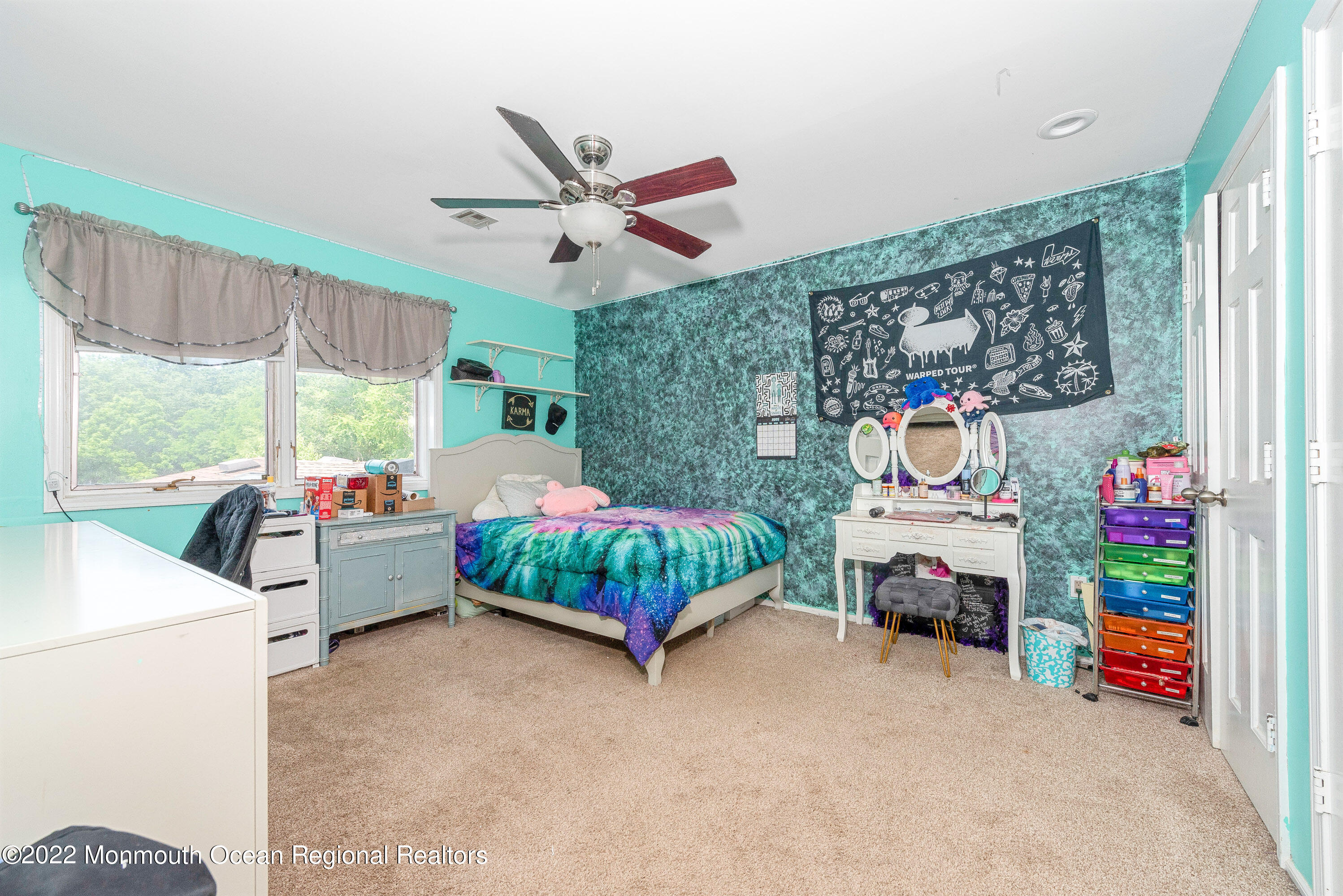 161 Thompson Grove Road Manalapan, NJ 07726 - Photo 19 of 27 a bedroom with a bed and a window