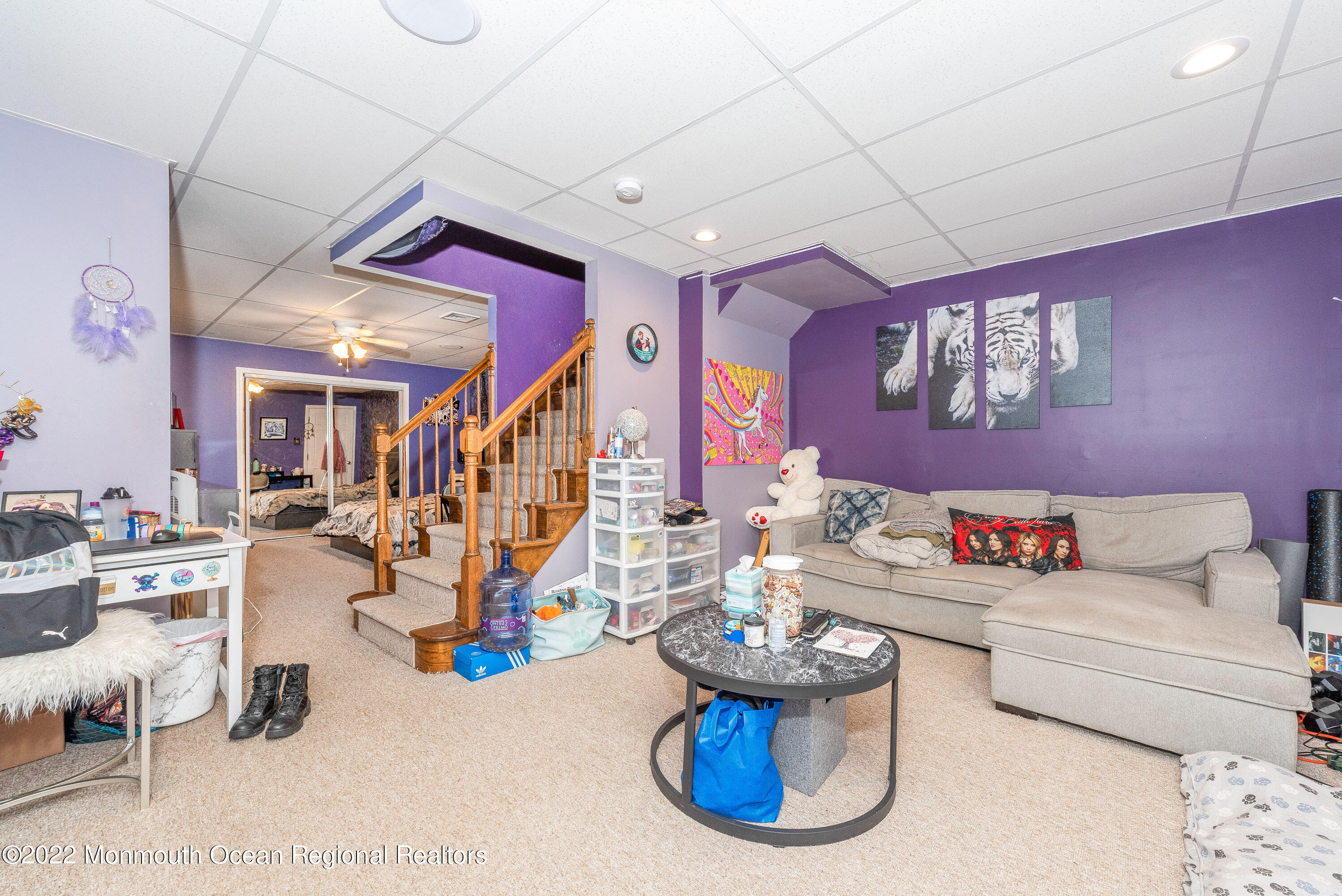 161 Thompson Grove Road Manalapan, NJ 07726 - Photo 23 of 27 a living room with furniture and a large window