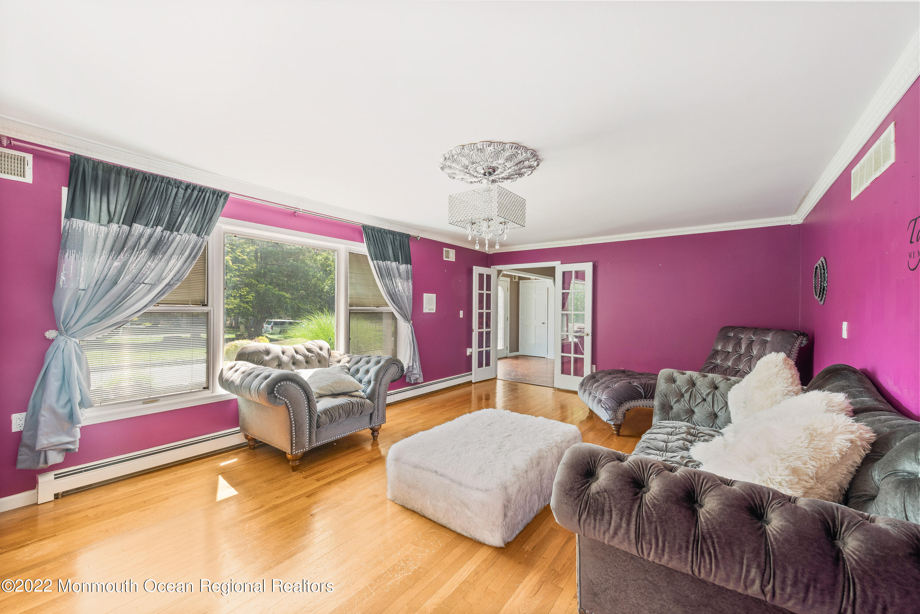 161 Thompson Grove Road Manalapan, NJ 07726 - Photo 10 of 27 a living room with furniture and a large window