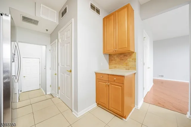 a view of walk in closet with window