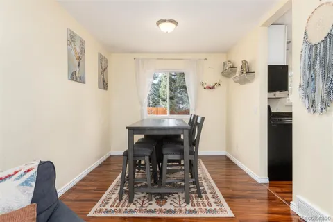 a bedroom with a bed and a lamp